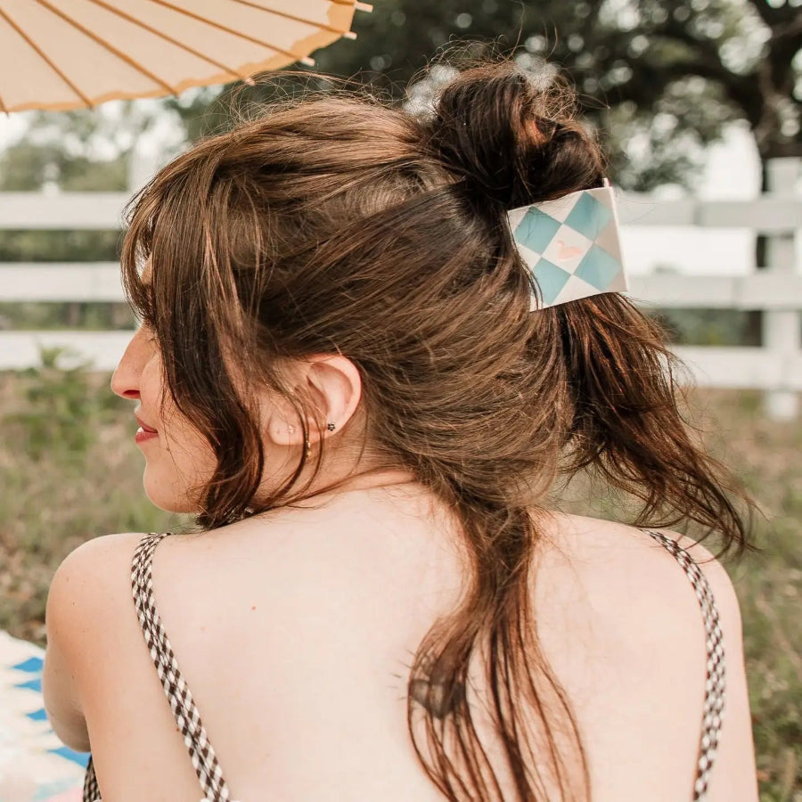 Lady wearing the swan patchwork hair claw in her hair