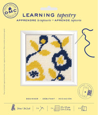 DMC Tapestry kit with yellow and blue flowers on a white background. 