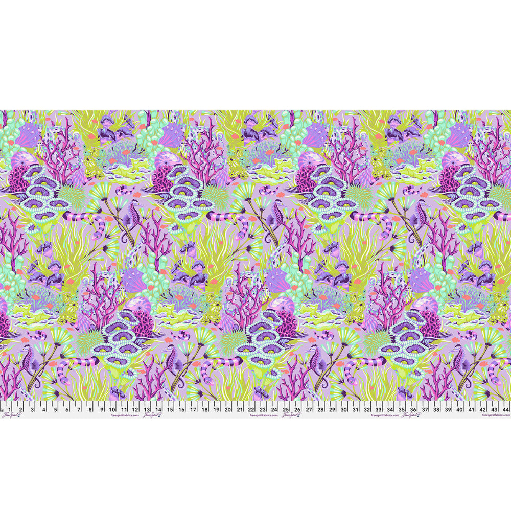 Colorful coral pattern fabric with a ruler at the bottom