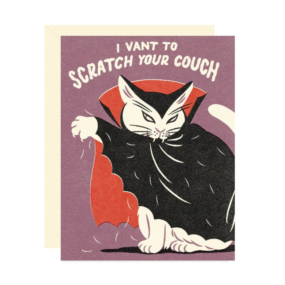 A card with a purple background with an illustration of a white cat with a widow's peak dressed as Dracula. Text reads" I Vant to Scratch Your Couch"