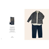 Jacket and pants set on a beige background